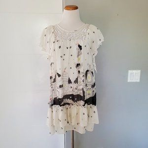 Star/cityscape side-zip tunic top